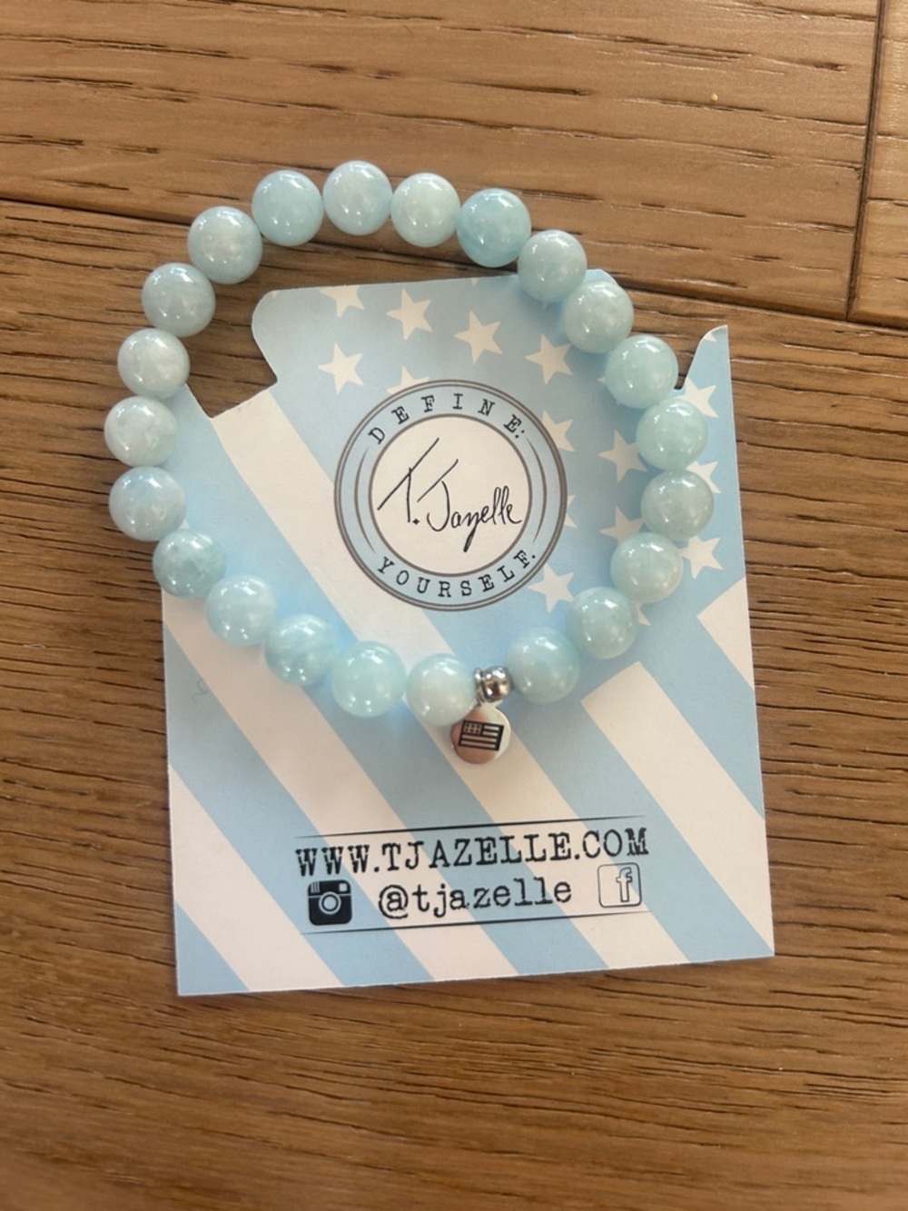 T.Jazelle Light Blue Beaded Bracelet with Flag Charm